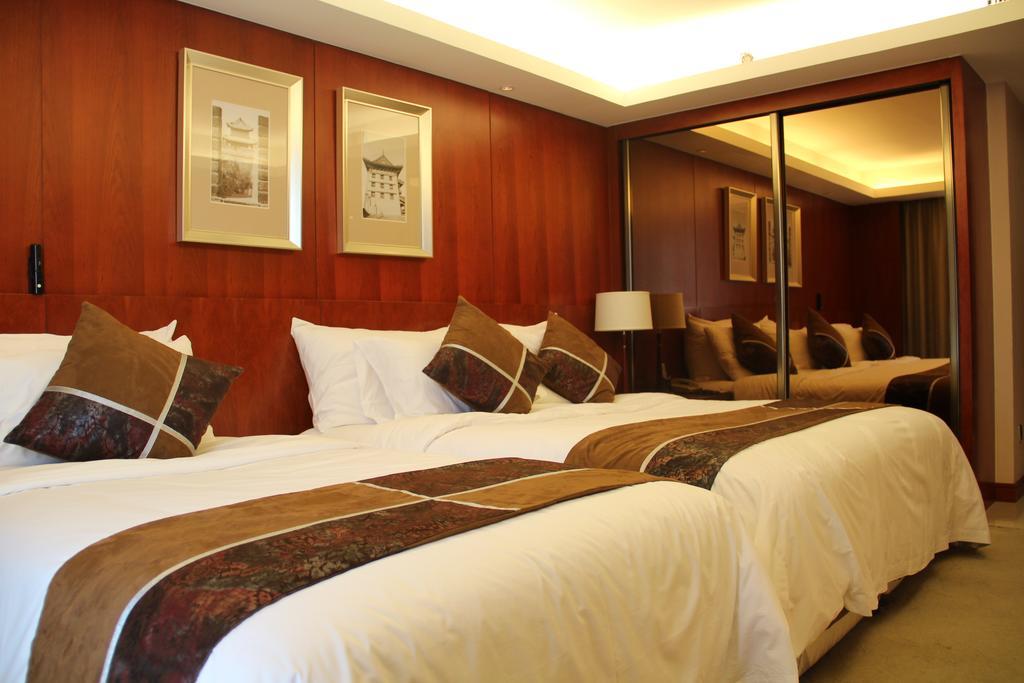 Xi'An Qu Jiang Yin Zuo Hotel Rom bilde